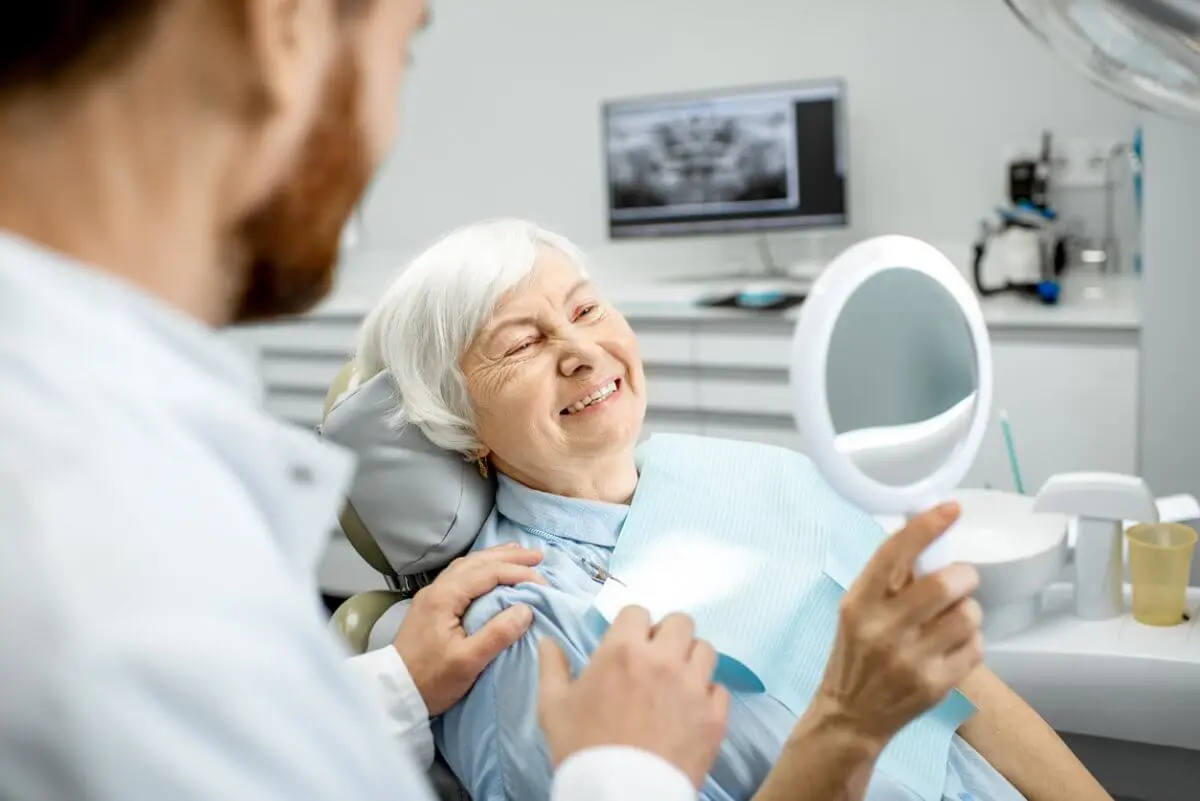 Smiling Woman After Dental Implant Recovery